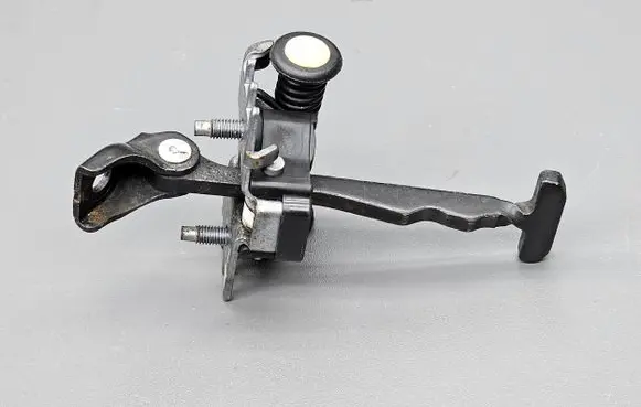 Rear door check strap stopper