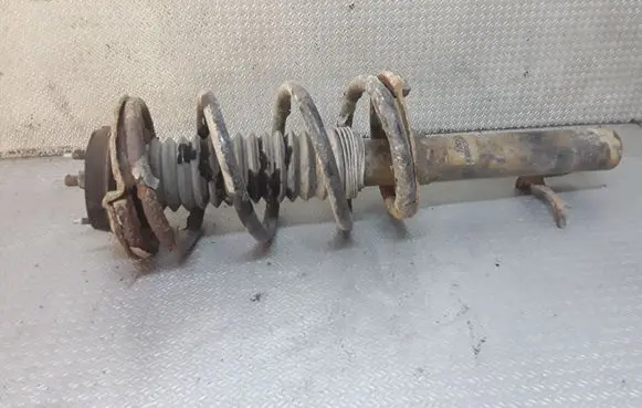Front shock absorber with coil spring
