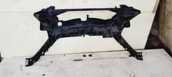 Radiator support slam panel
