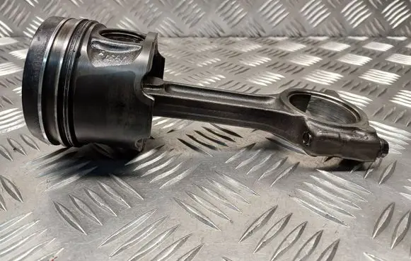 Piston with connecting rod