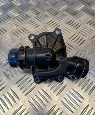 Thermostat/thermostat housing