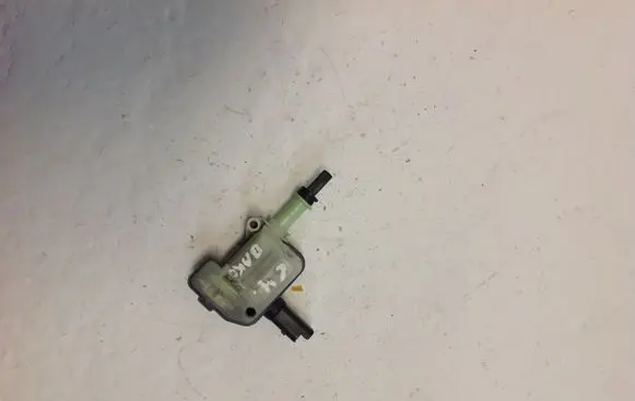 Fuel tank cap lock motor