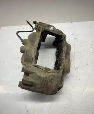 Toyota Hilux VIII Front brake caliper 