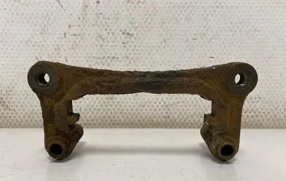 Mitsubishi Grandis Brake caliper pad carrier rear MN116285