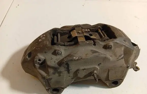 Volkswagen Touareg I Front brake caliper 