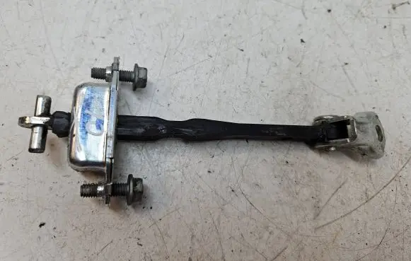 Suzuki SX4 Rear door check strap stopper