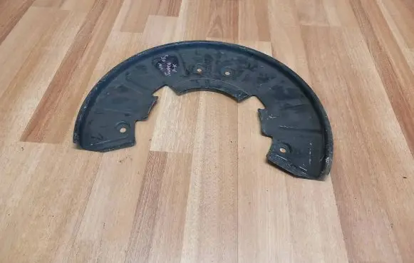 Volkswagen Touareg I Front brake disc dust cover plate 7L0615311B