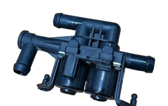 Coolant heater control valve