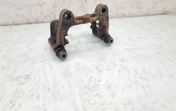 Volkswagen PASSAT B6 Brake caliper pad carrier rear 