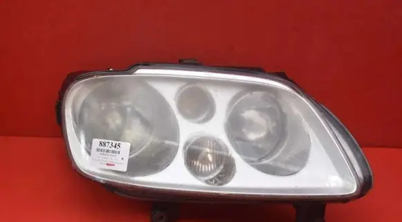 Volkswagen Touran I Headlight/headlamp 1T0941006F