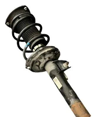 Volkswagen Golf VII Front shock absorber with coil spring 5Q0413023FJ