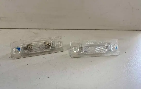 Volkswagen Caddy Number plate light 7E0943021A
