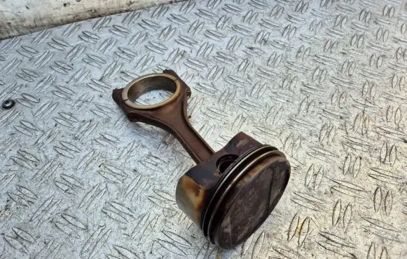 Piston with connecting rod