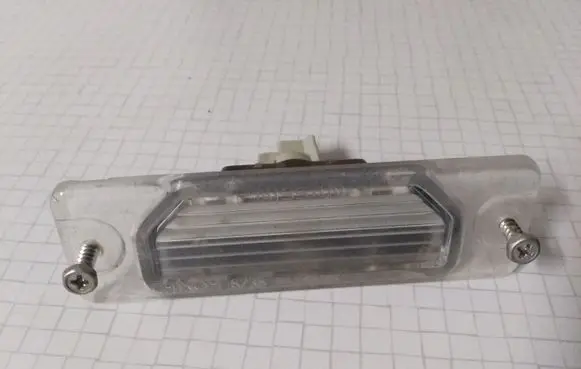 Nissan Almera N16 Number plate light 623800LE130184