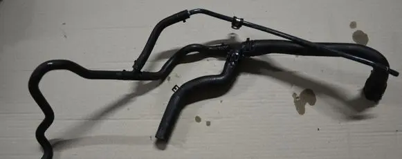 Volkswagen Golf VII Engine coolant pipe/hose 5Q0122101FP