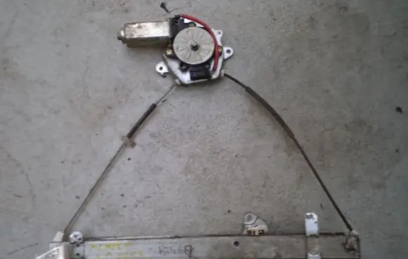 Nissan Almera Front door window regulator with motor