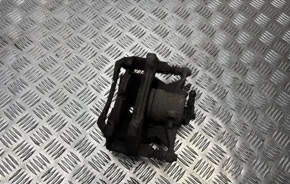 Volkswagen Golf VII Front brake caliper