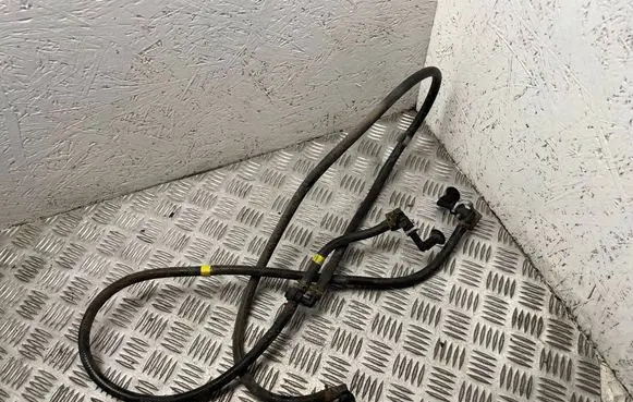 Nissan Juke I F15 Headlight washer spray nozzle