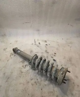 Mitsubishi Pajero Front shock absorber with coil spring 