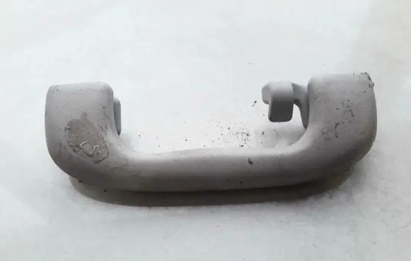 Suzuki Swift I Front interior roof grab handle 13109053