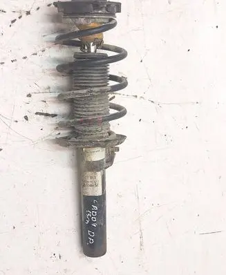 Volkswagen Caddy Front shock absorber with coil spring