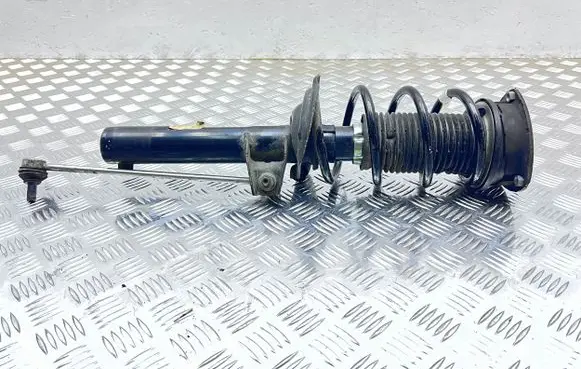 Volkswagen Golf VII Front shock absorber with coil spring 5Q0413031FN 5Q0412037JL