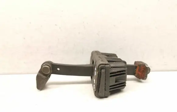 Front door check strap stopper