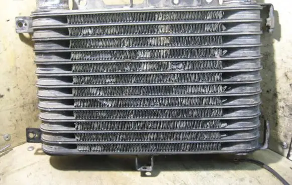 Mitsubishi Pajero Sport I Intercooler radiator DENSO1271000290