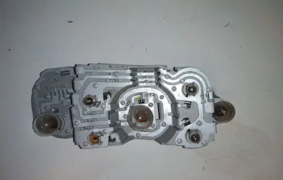 Toyota Corolla Verso E121 Tail light bulb cover holder