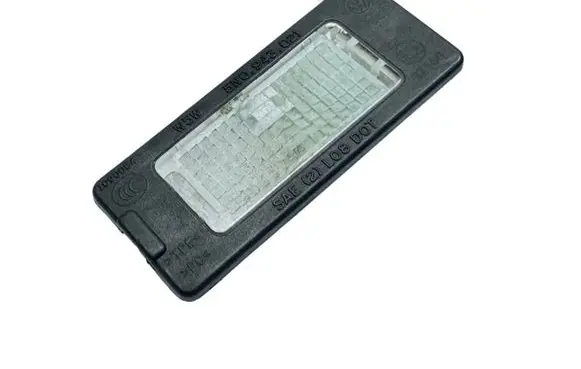 Volkswagen Jetta VI Number plate light 5N0943021