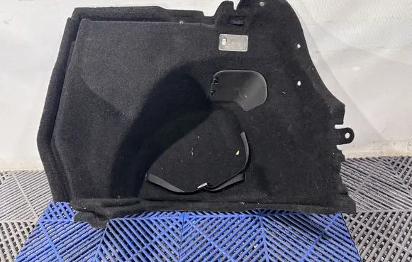 Trunk/boot lower side trim panel