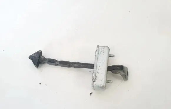 Front door check strap stopper