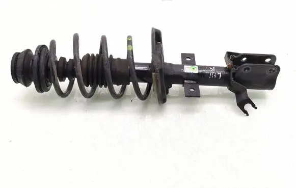 Dacia Logan III Front shock absorber with coil spring 