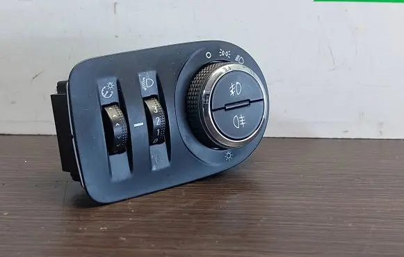 Opel Corsa D Fog light switch 13310335 4099 321414