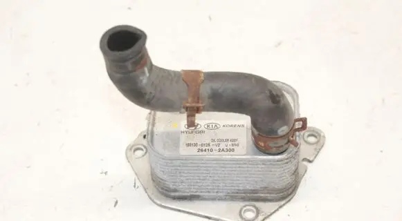 KIA Sportage Engine oil radiator 264102A300