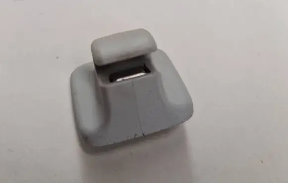 Volkswagen PASSAT B6 Sun visor clip/hook/bracket 1K0857561B