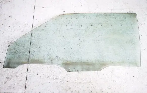 Mazda 323 Front door window glass four-door