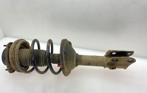 Subaru Forester SF Front shock absorber with coil spring