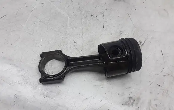 Piston with connecting rod