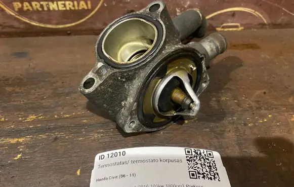 Thermostat/thermostat housing