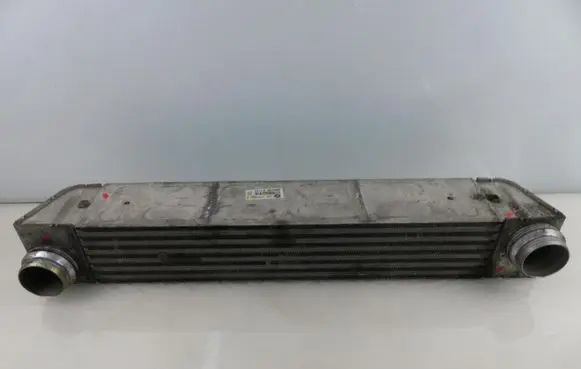 BMW 5 E60 E61 Intercooler radiator 7787446