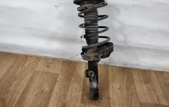 Citroen Berlingo Front shock absorber with coil spring