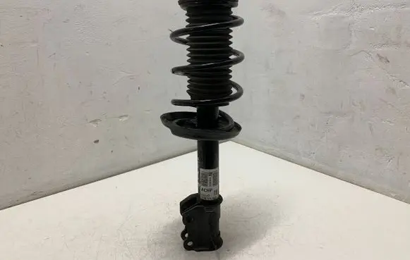 Opel Corsa E Front shock absorber with coil spring 13434140 22283525