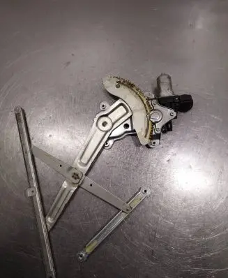 Suzuki Swift I Front door window regulator with motor 8343063J00