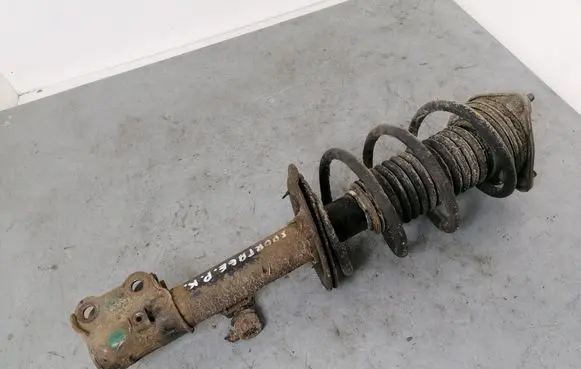 KIA Sportage Front shock absorber with coil spring 546603U000