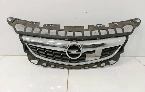 Opel Astra J Front bumper upper radiator grill 13266577