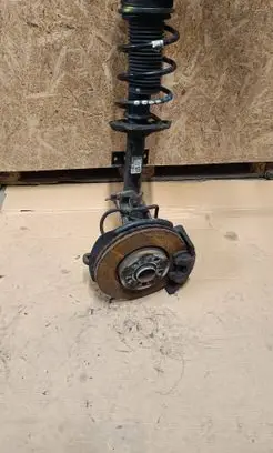 Front wheel hub spindle knuckle