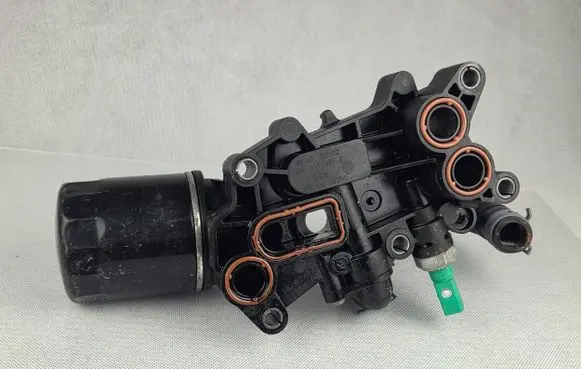 Skoda Fabia Mk3 (NJ) Oil filter mounting bracket 04B115389B