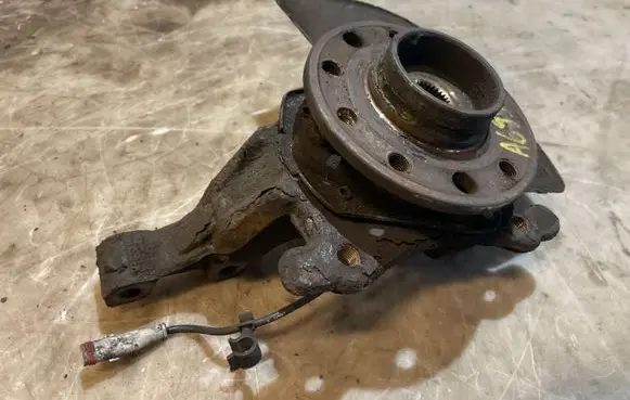 Front wheel hub spindle knuckle