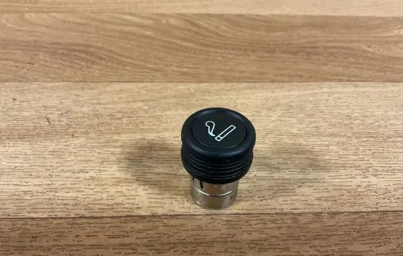 Nissan Primera Cigarette lighter 12V5K04